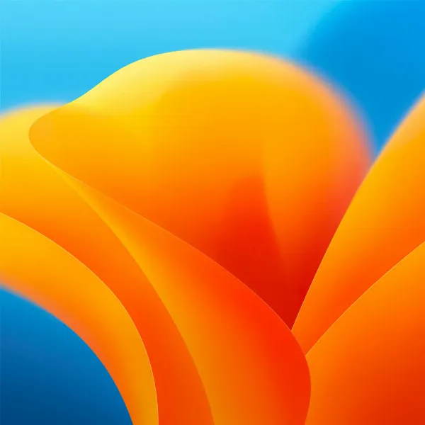 Hình nền macOS Ventura phiên bản sáng với tông màu cam và xanh dương chủ đạo