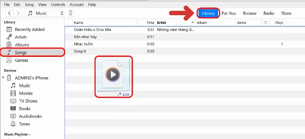 Giao diện iTunes hiển thị thư viện nhạc và danh sách bài hát